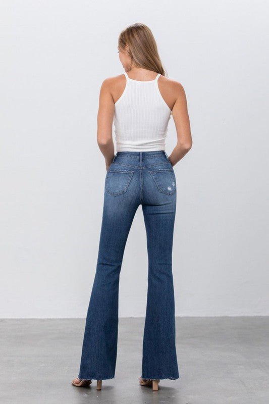 
                  
                    MID RISE DARK WASH FLARE JEANS
                  
                