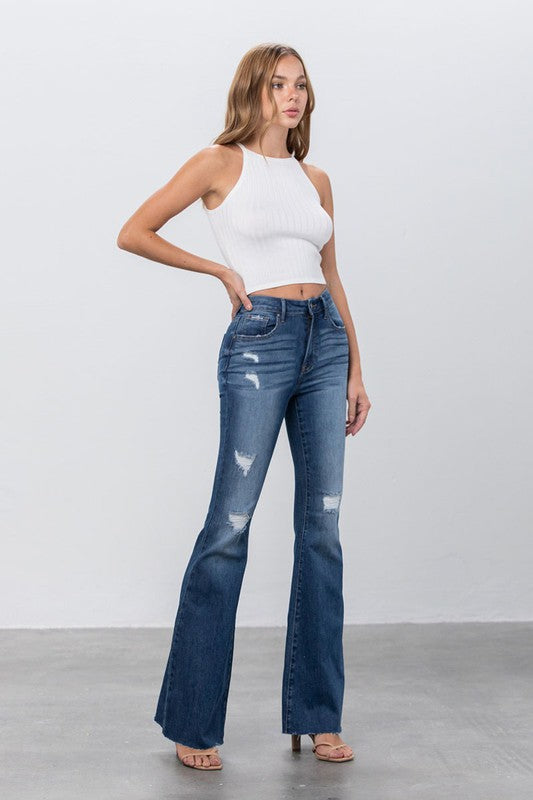 
                  
                    MID RISE DARK WASH FLARE JEANS
                  
                