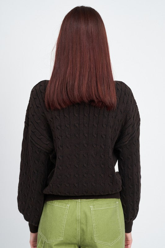 
                  
                    CABLE KNIT TOP WITH BUBBLE SLEEVES
                  
                