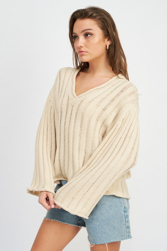 
                  
                    OVERSIZED RIB KNIT SWEATER
                  
                