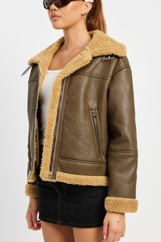 
                  
                    SHEARLING MOTO JACKET
                  
                