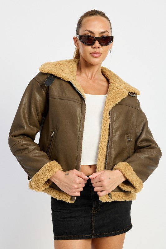 
                  
                    SHEARLING MOTO JACKET
                  
                