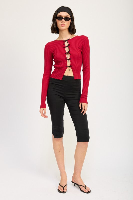 
                  
                    LONG SLEEVE RIBBED TOP WITH BOW DETAIL
                  
                