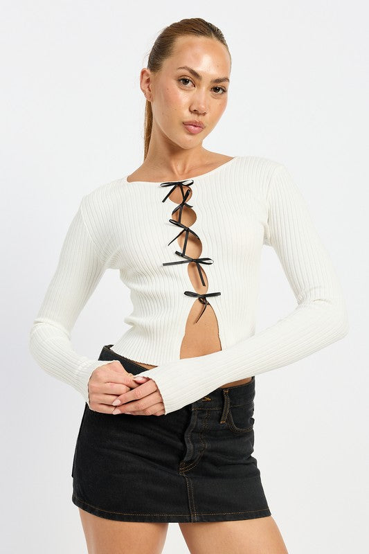 
                  
                    LONG SLEEVE RIBBED TOP WITH BOW DETAIL
                  
                